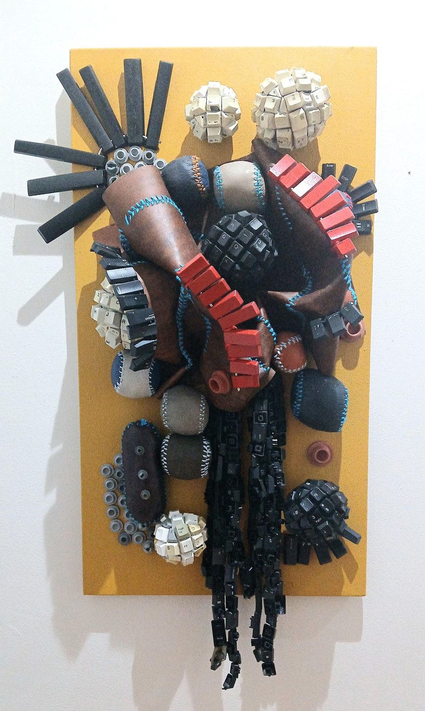 Maurice Mbikayi mixed-media work: Digital DNA 3, leather and computer keys on canvas