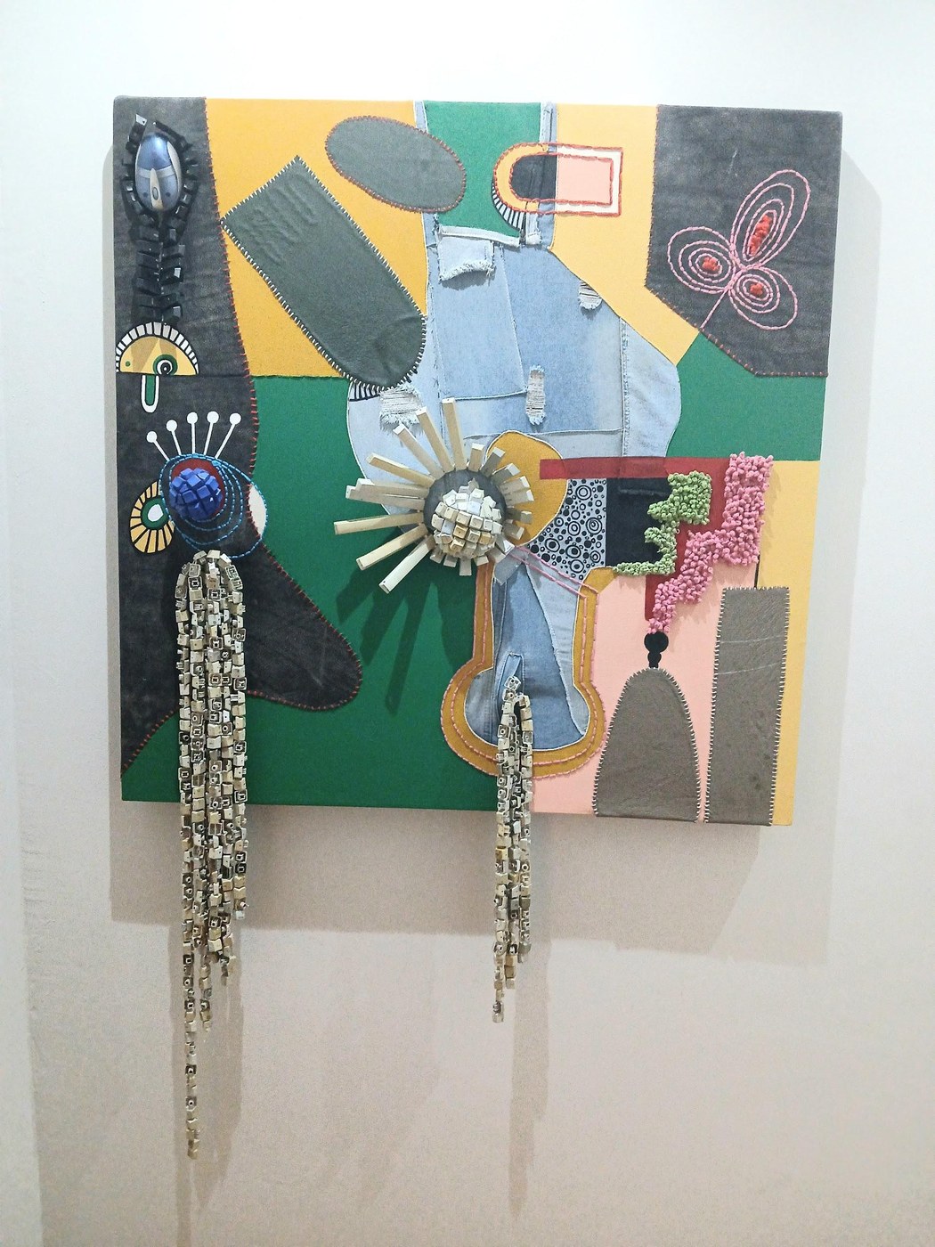 Maurice Mbikayi mixed-media work: Urban Utopia 3, leather, computer keys and mouse on canvas