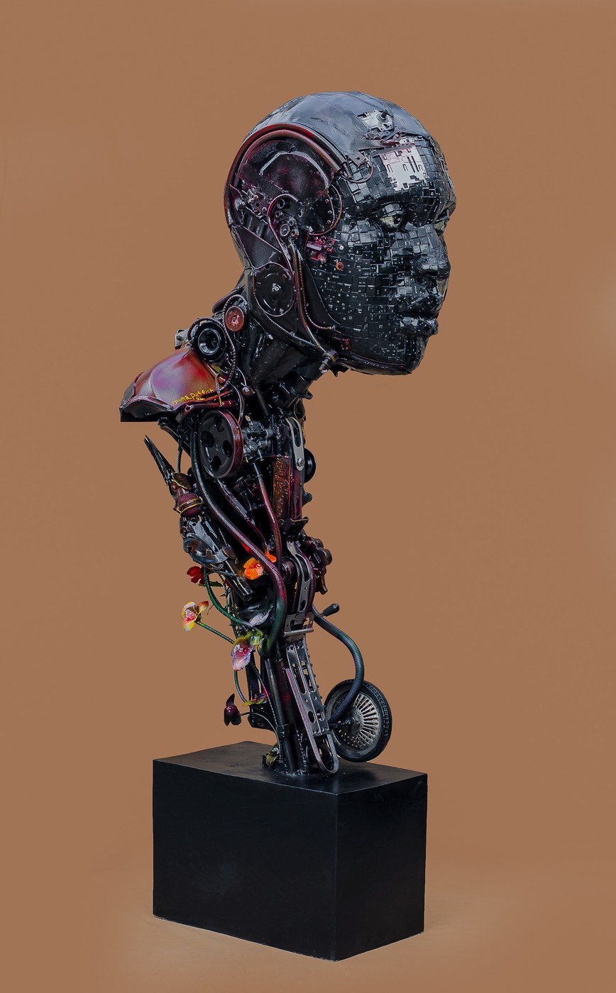 Ozuma Patrick Chidiebube sculpture: Mortal and Machine, a mechanical head and torso assembled from recycled keyboard parts
